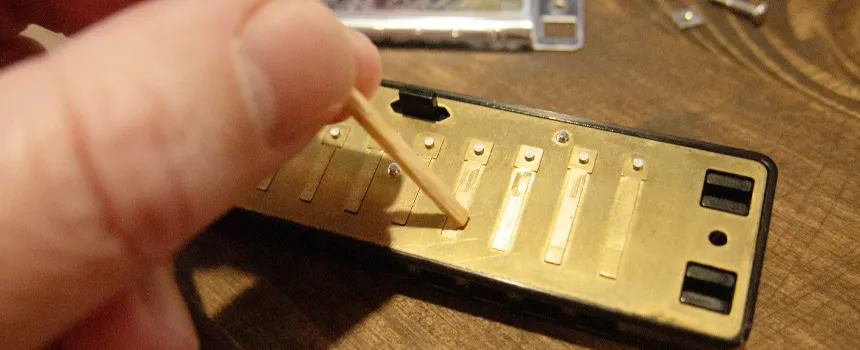 Настройка язычков губной гармошки